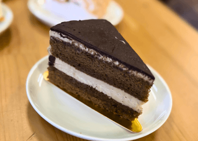 Slice of coffee cream cake with chocolate layers at GG’s Pastry Shop in Mount Airy, MD