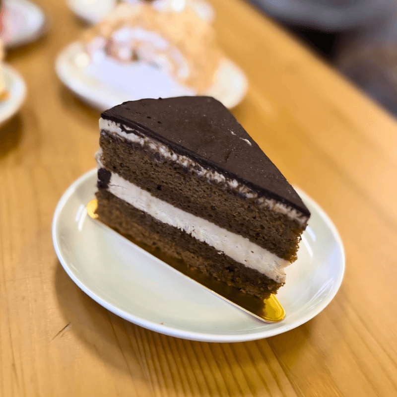 Slice of coffee cream cake with chocolate layers at GG’s Pastry Shop in Mount Airy, MD
