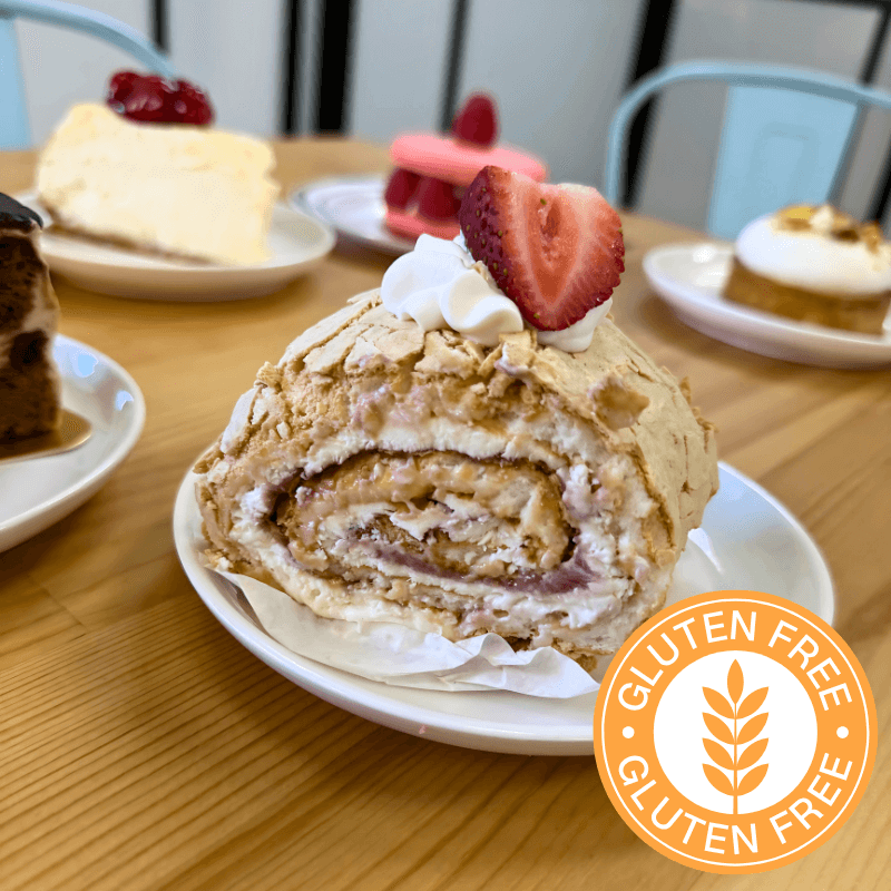 Gluten-free strawberry roulade with cream filling and fresh strawberry on top at GG’s Pastry Shop in Mount Airy, MD