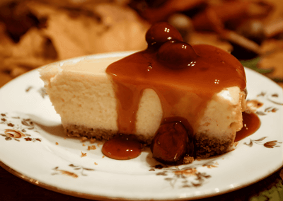 Slice of cheesecake topped with strawberry sauce at GG’s Pastry Shop in Mount Airy, MD